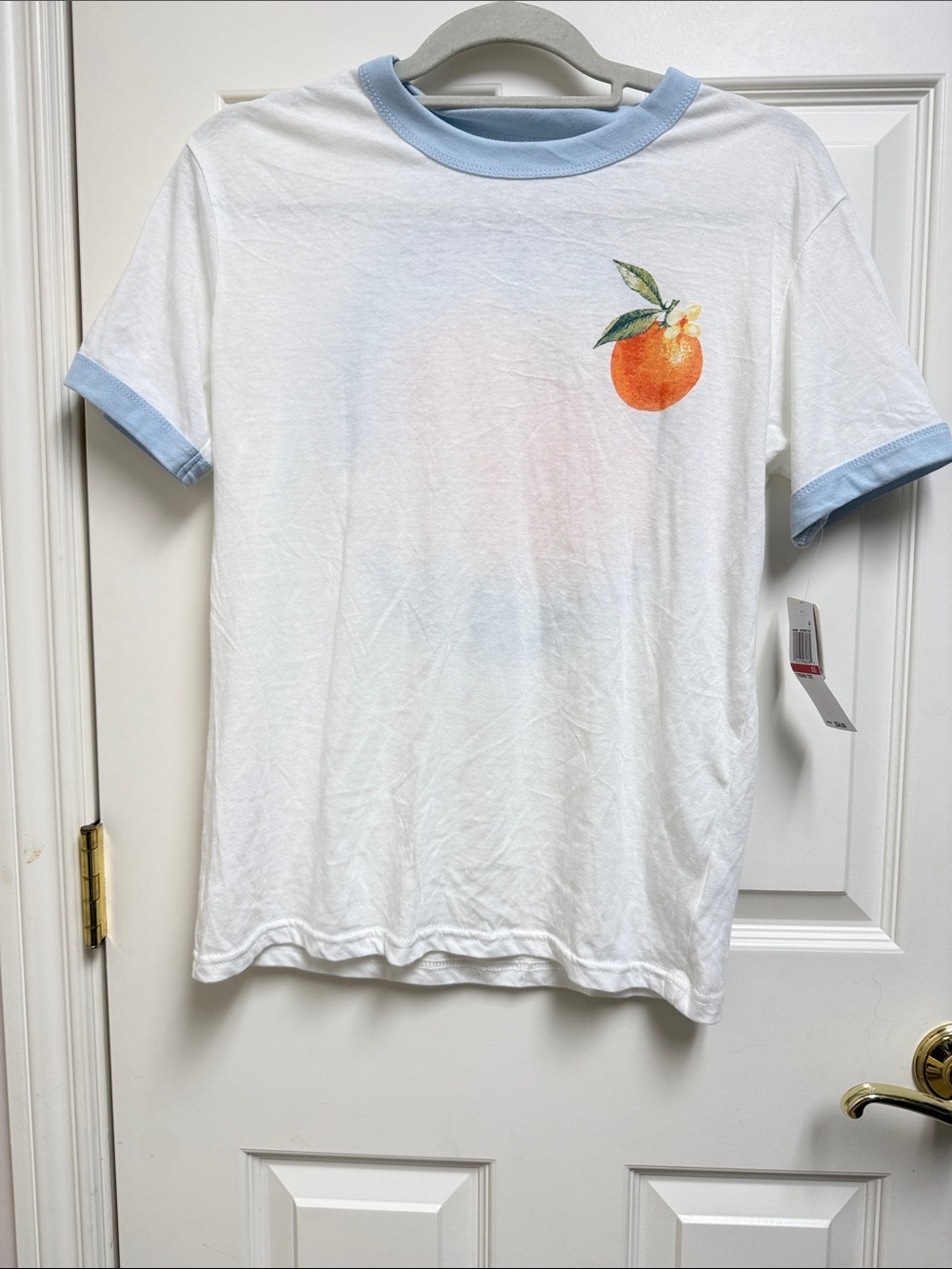 Rebellious One White Ringer Tee with Light Blue Trim and Orange Graphic
